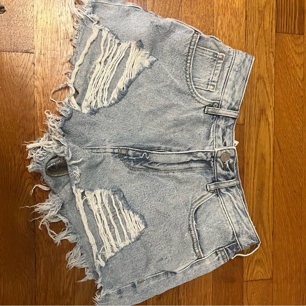 Distressed denim shorts